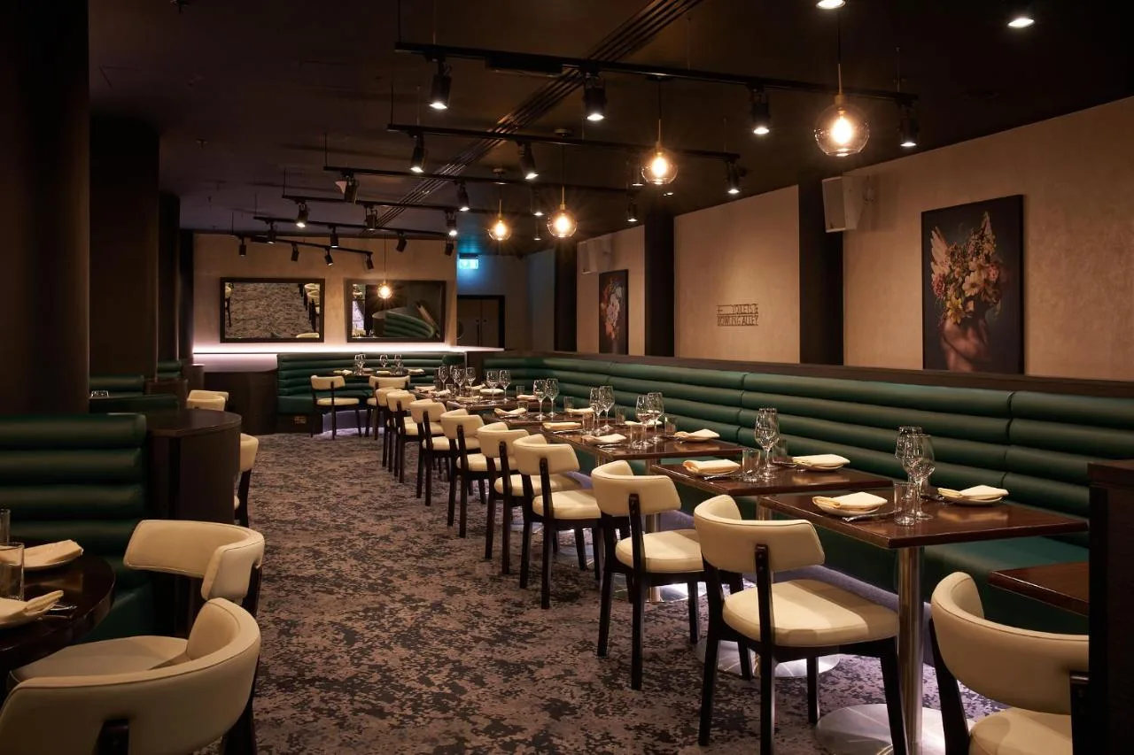 Row of tables and chairs in the hotel restaurant