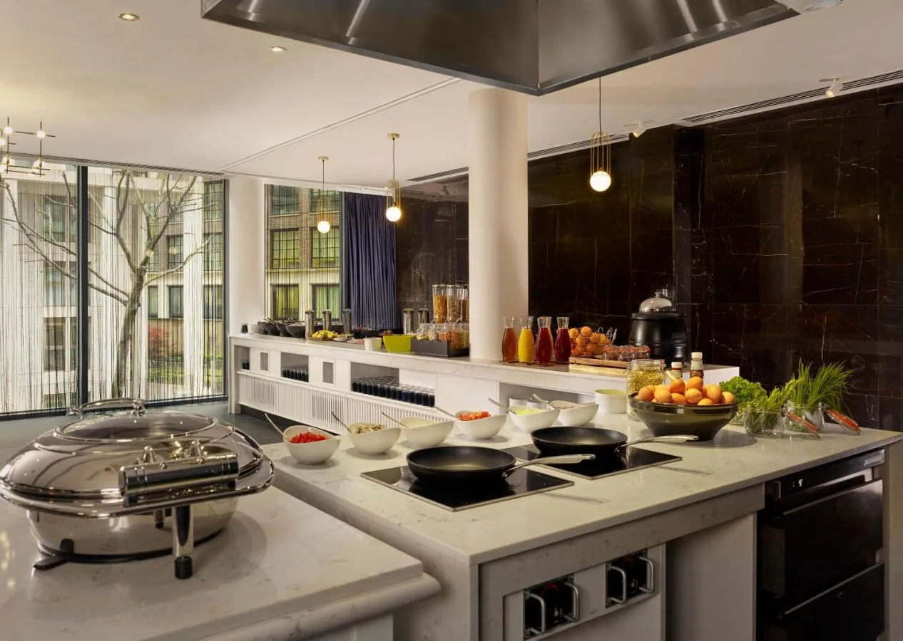 Hotel kitchen with cookware on the counter